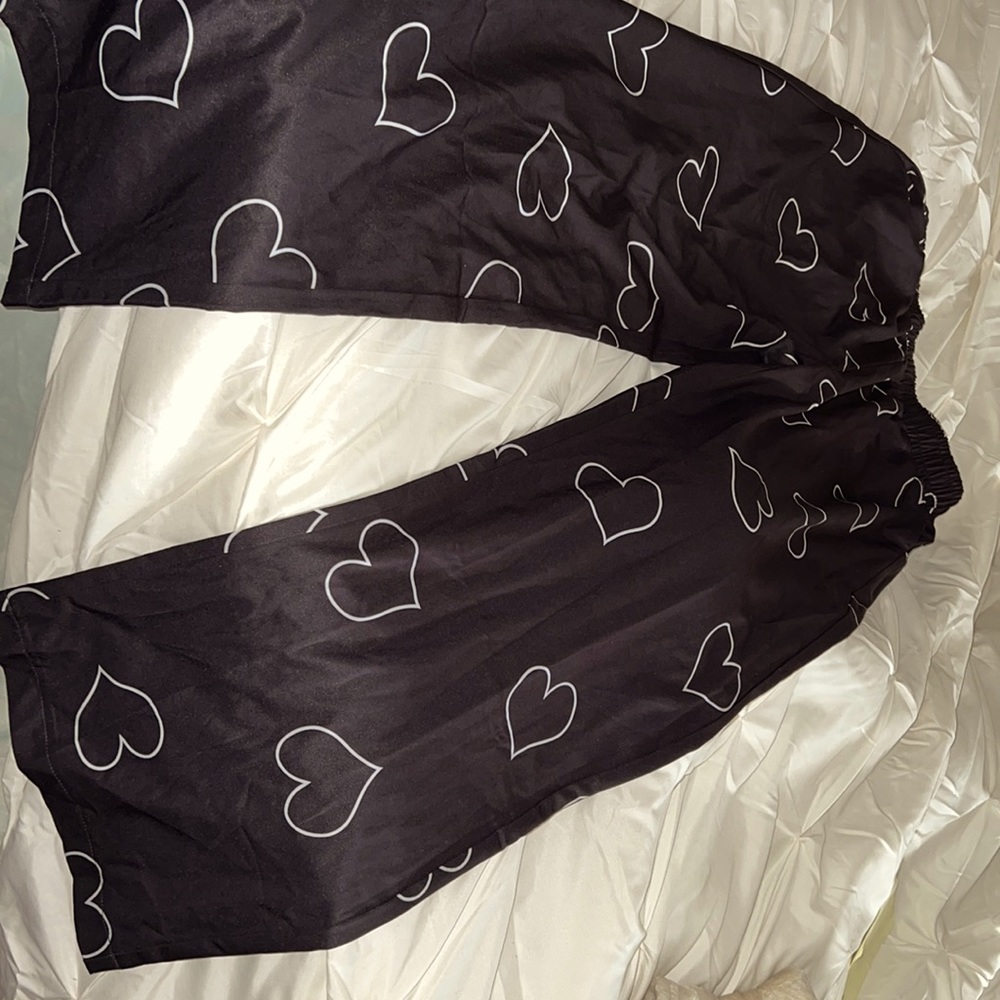 Black with hearts/ 94% polyester/ size 6/lounging pajamas.